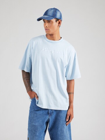T-Shirt Karl Kani en bleu : devant