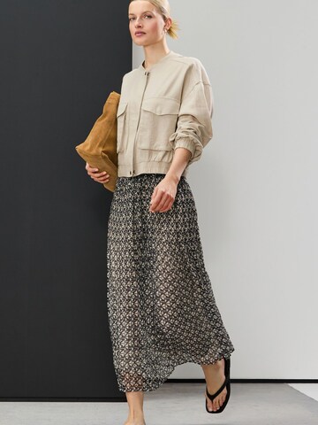 Next Rok in Zwart