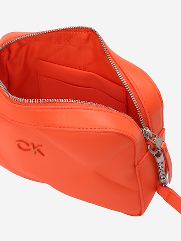 Calvin Klein Schoudertas 'Re-Lock' in Oranje