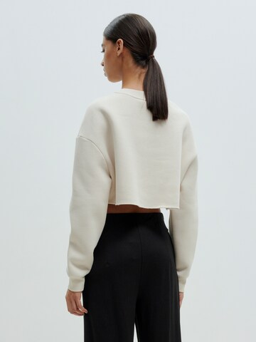 EDITED Sweatshirt 'Maxie' in Beige