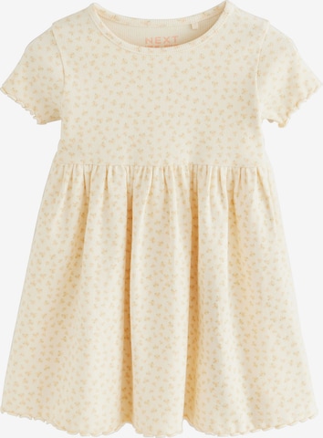 Next Mekko värissä keltainen: etupuoli