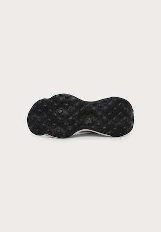 balts UNDER ARMOUR Sporta apavi 'Pulse'