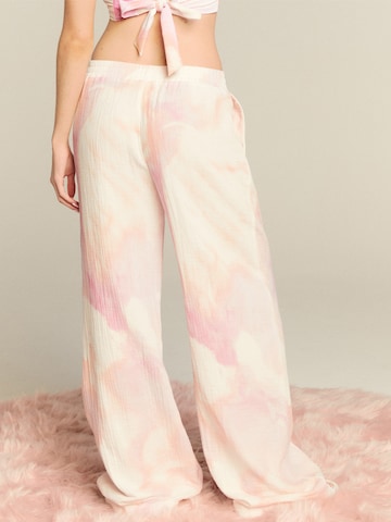 LENI KLUM x ABOUT YOU Wide leg Trousers 'Charlotte' in Pink