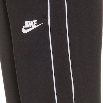 Nike Sportswear Tapered Trousers in Black