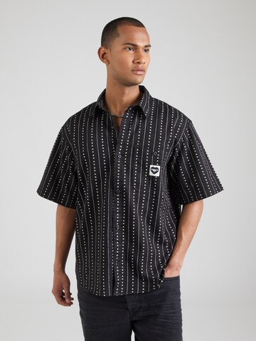 Fit confort Chemise 'Drewe' Carhartt WIP en noir : devant