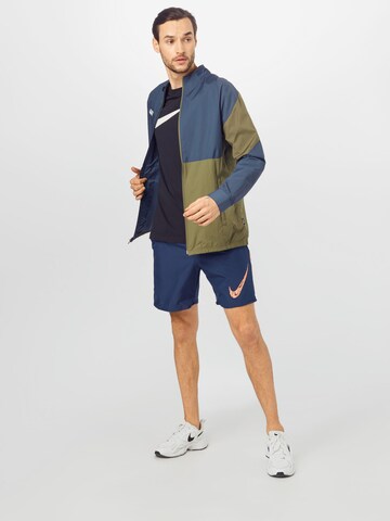 Veste de sport NIKE en bleu