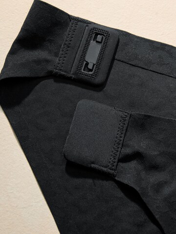 juoda Next Moteriškos kelnaitės