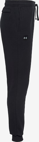 UNDER ARMOUR Tapered Sports trousers 'RIVAL' in Black