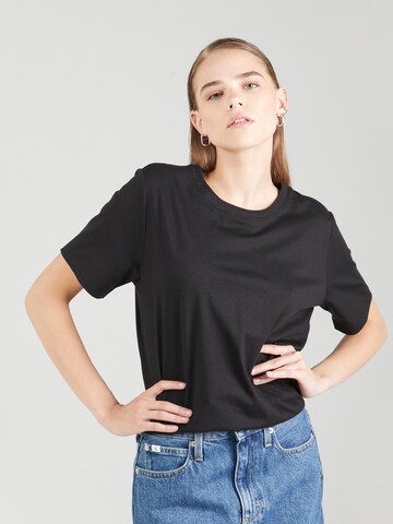 Calvin Klein - Camiseta en negro: frente