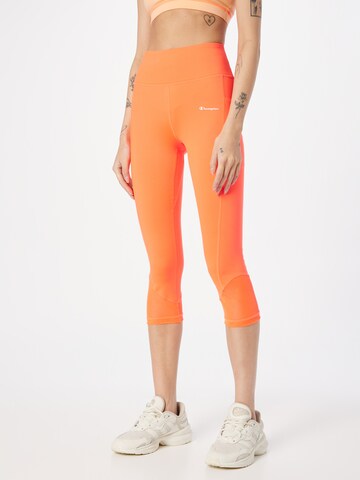 Champion Authentic Athletic Apparel Skinny Workout Pants in Orange: front