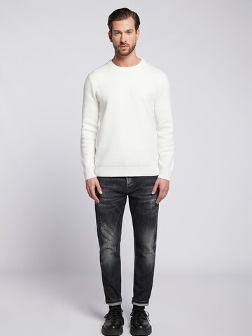 Goldgarn Tapered Jeans in Zwart