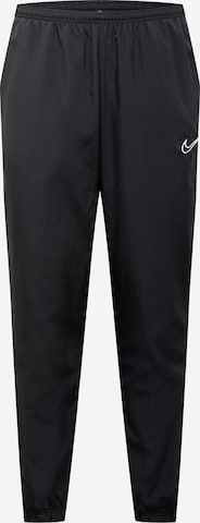 Pantalon de sport NIKE en noir : devant