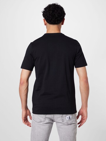 ADIDAS SPORTSWEAR Performance shirt 'Bagde of Sport Courts Graphic' in Black