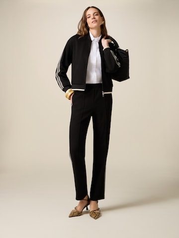 oltre - Loosefit Pantalón en negro: frente
