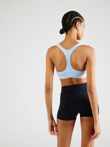 Bustino Reggiseno sportivo 'Swoosh' di NIKE in blu