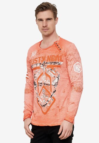 Rusty Neal Langarmshirt Rundhals Printed in Orange: predná strana