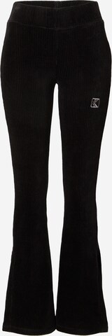 Karl Kani Flared Trousers in Black: front