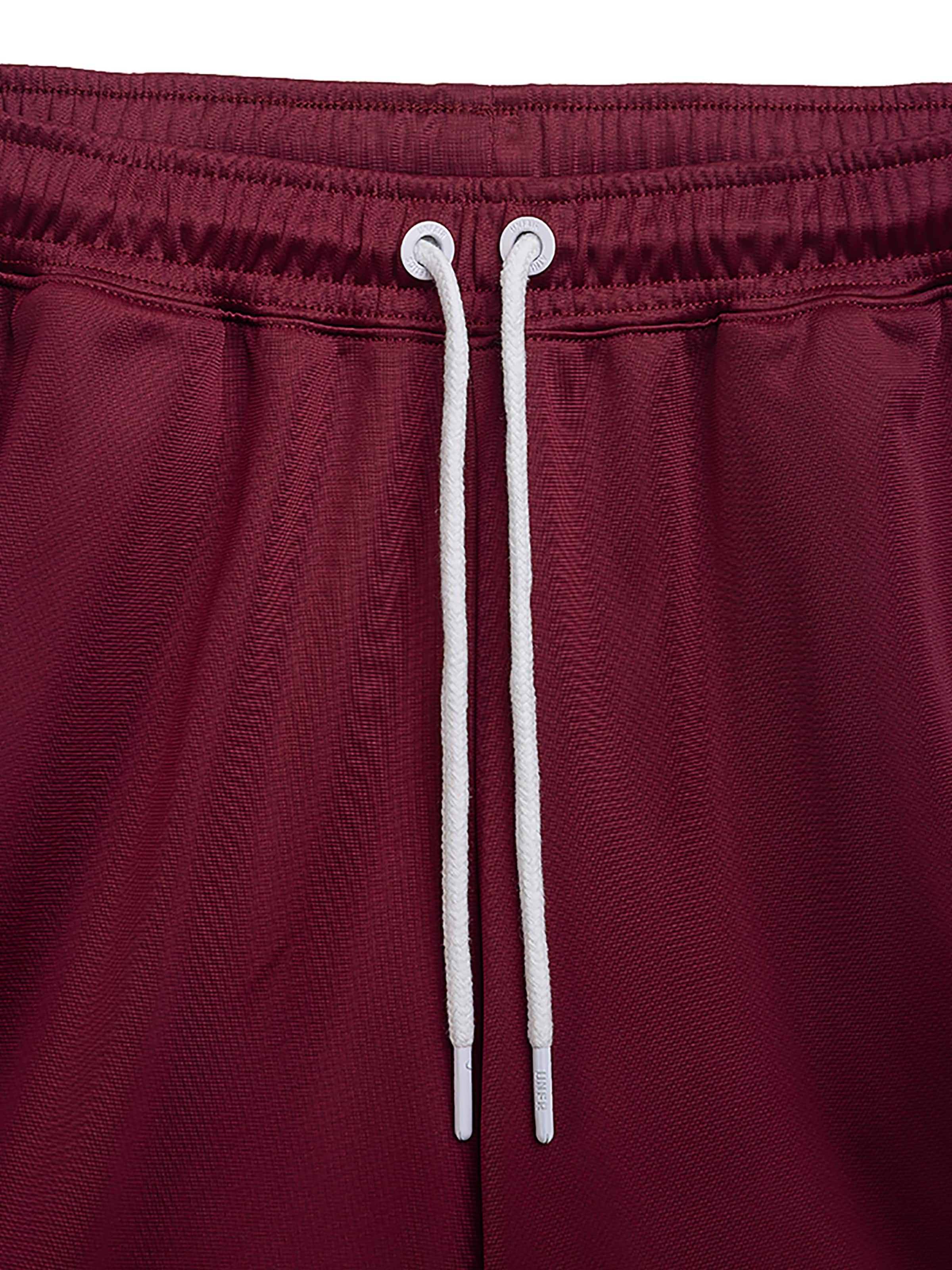 Loosefit Pantaloni sportivi 'Athletic DMWU' di Unfair Athletics in colori misti
