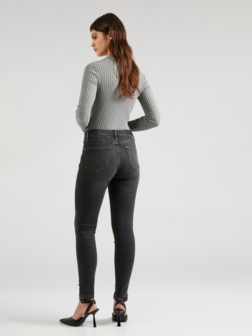 s.Oliver Skinny Jeans 'Izabell' in Zwart