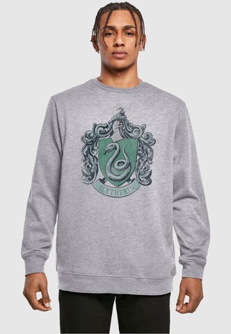 ABSOLUTE CULT Sweatshirt 'Harry Potter - Distressed Slytherin' in Grijs: voorkant