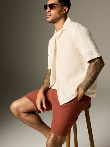 Next - regular Pantalón chino en rojo