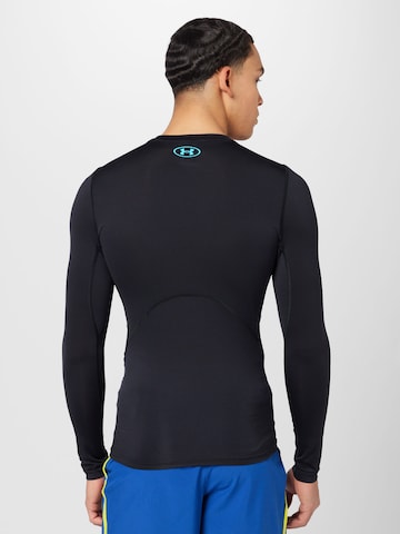 UNDER ARMOUR - Camiseta funcional 'Novelty' en negro