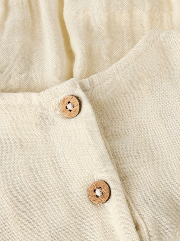 Tutina / body per bambino di Lil'Atelier in beige