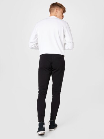 Calvin Klein Jeans Zúžený Kalhoty – černá