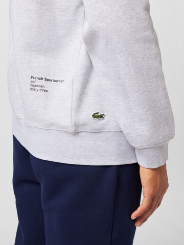 Sweat-shirt LACOSTE en gris