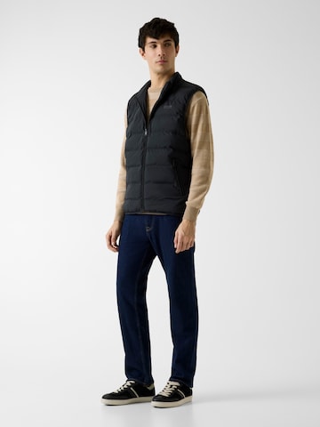 GUESS - Chaleco en negro: frente