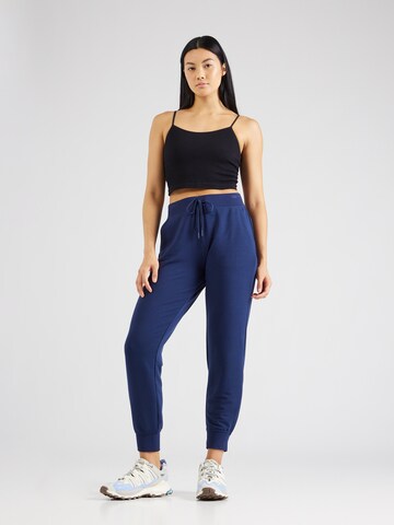 Effilé Pantalon de sport SKECHERS en bleu