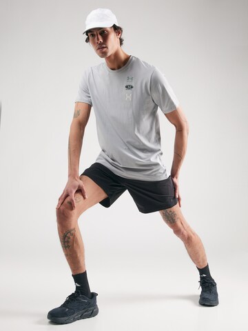 Tricou funcțional de la UNDER ARMOUR pe gri