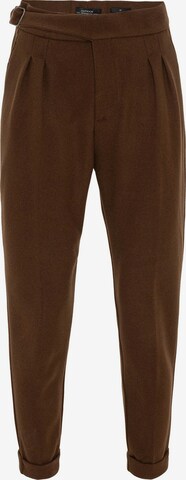 Antioch Tapered Pleat-Front Pants in Brown: front