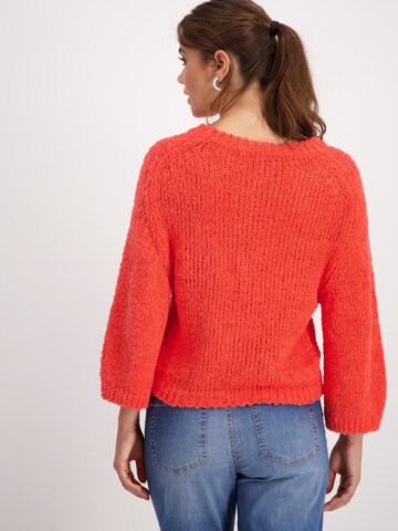 Pullover di monari in arancione