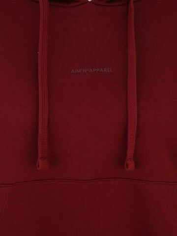 Aim'n Urheilullinen collegepaita värissä punainen