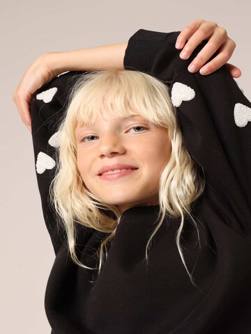 Pull-over 'SARINA' Deeluxe en noir