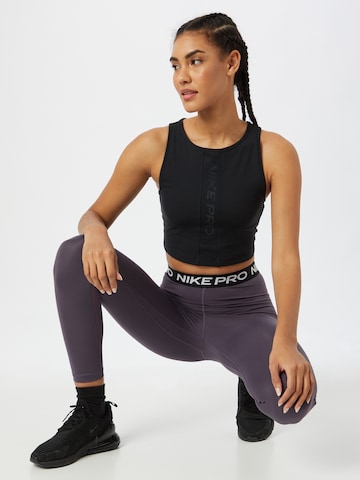 NIKE Sportovní top – černá