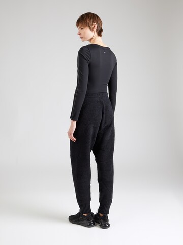 Nike Sportswear Tapered Trousers 'Phoenix' in Black