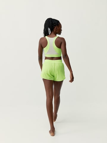 Haut de sport 'Padma 2.0' Born Living Yoga en vert