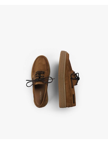 Scalpers Pantofle w kolorze brązowy