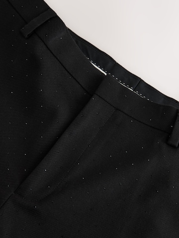 Coupe slim Pantalon à plis Next en noir