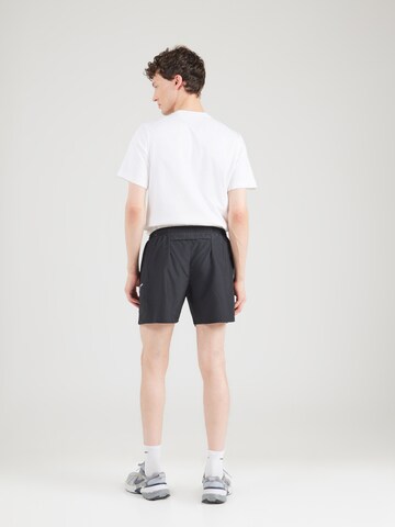 NIKE Normalny krój Spodnie sportowe 'MILER' w kolorze czarny