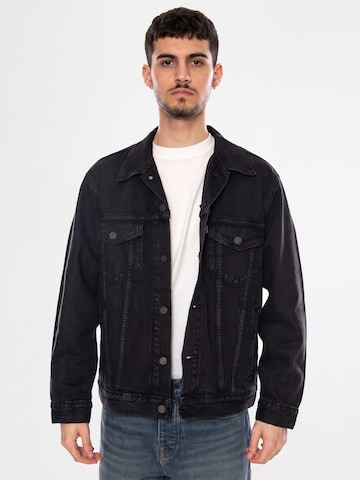 LEVI'S ® Between-season jacket 'RELAXED TYPE III TRUCKER JACKET BLACK' in Black