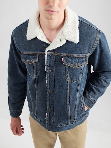 LEVI'S ® Átmeneti dzseki 'Relaxed Fit Sherpa Trucker Jacket' - kék