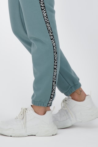 Alife and Kickin Tapered Trousers in Blue