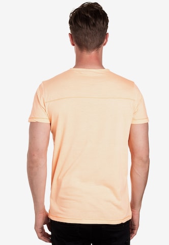 Rusty Neal T-Shirt in Orange