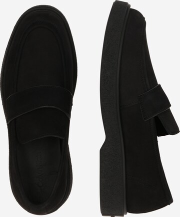 Calvin Klein Slip-ons in Black