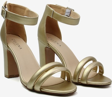 Celena - Sandalias con hebilla 'Chelsie' en oro