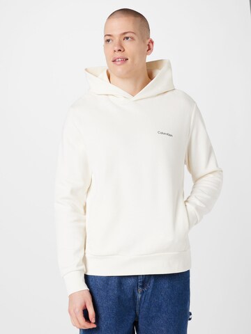 Calvin KleinSweater majica - bež boja: prednji dio