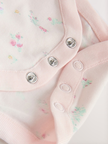 Next - Pijama entero/body en rosa